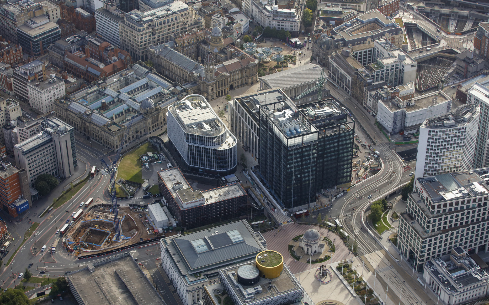 Paradise development showing One & Two Chamberlain Square and One Centenary Way. Progress is being made on the Octagon foundations. Aerial view.