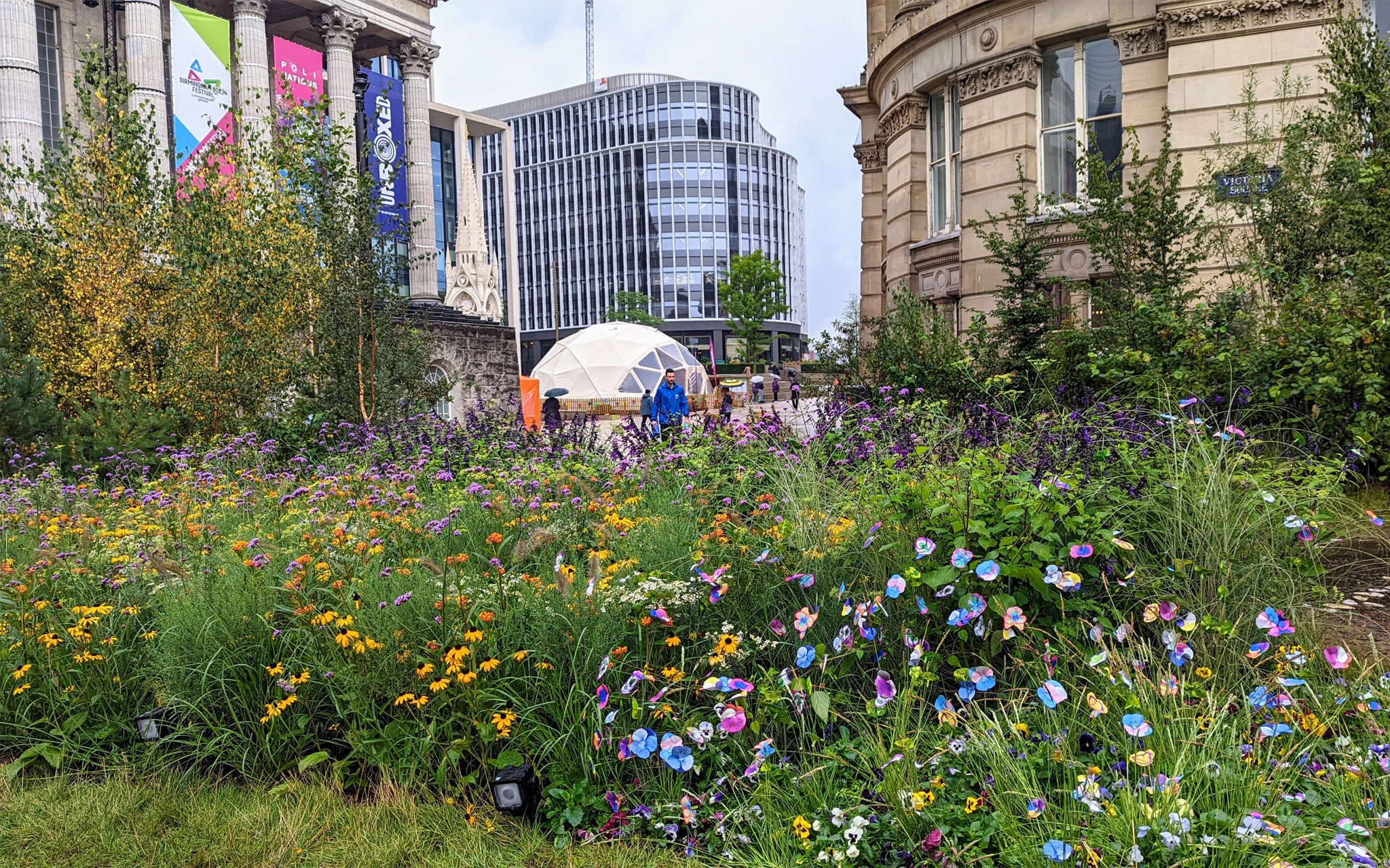 Garden of flowers created in Victoria Square by Poli-Nations.