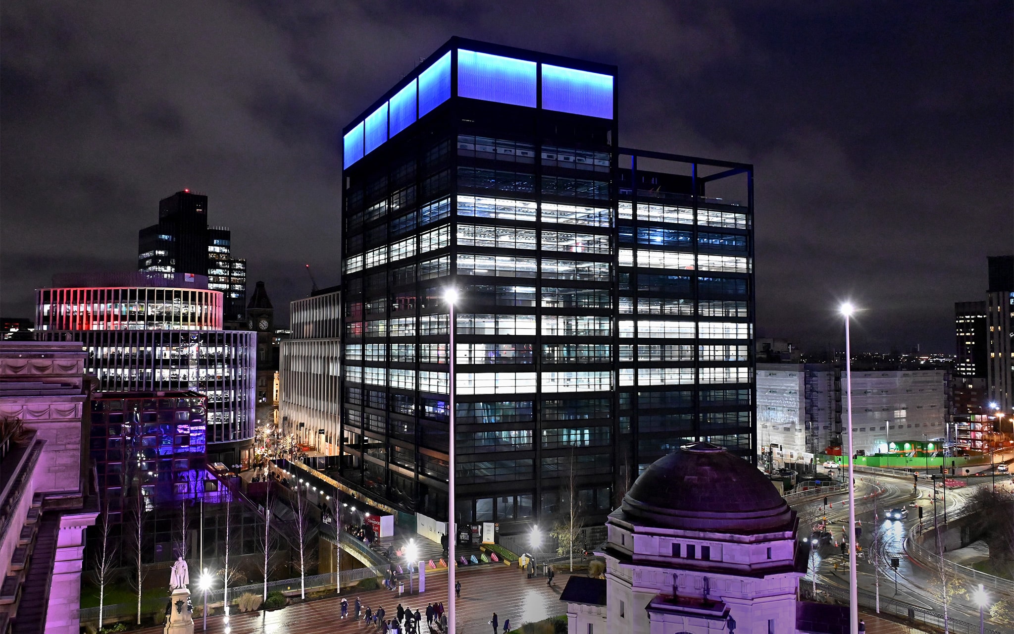 One Centenary Way, Paradise Birmingham with the glass lantern lit up at night.